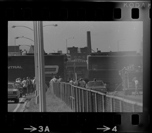 Runaway Penn Central locomotives block most of the Northbound lane of the Southeast Expressway in South Boston