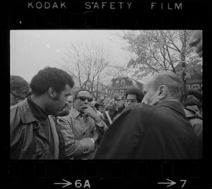Rev. Robert Drinan, Dean of Boston College Law School and committee chairman of Massachusetts Advisory Committee to the US Civil Rights Commission, and others being interviewed during Tufts University student protests