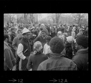 Tufts University student protesters seen gathered around a speaker