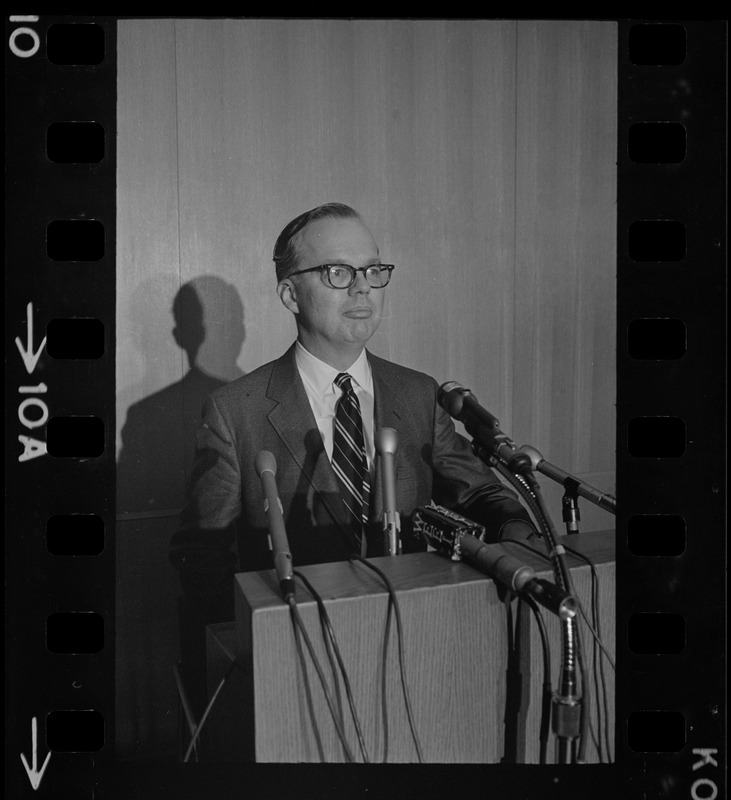 A man speaking from a podium