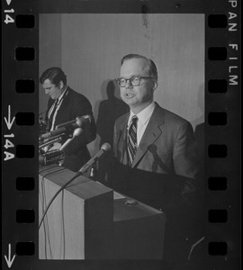 A man speaking from a podium