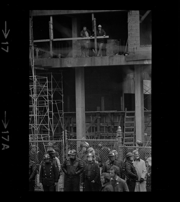 View of Tufts University construction site with police seen in the foreground