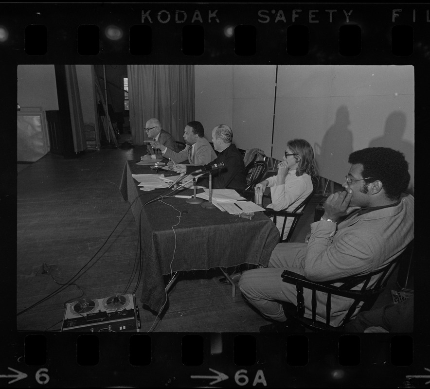 Panel sitting at table speaking during Tufts University student protest ...