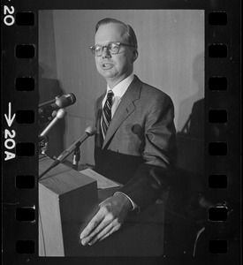 A man speaking from a podium