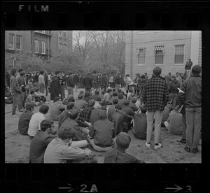 Harvard students gathered behind University Hall, listening to student protesters