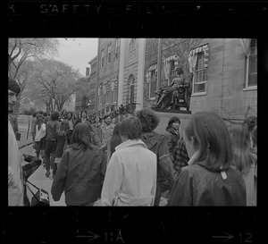 Students protesting around John Harvard statue in Harvard Yard