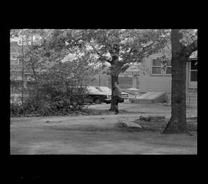 A man seen winding up to throw an object