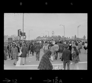 Student protesters marching along Memorial Drive to Soldiers Field