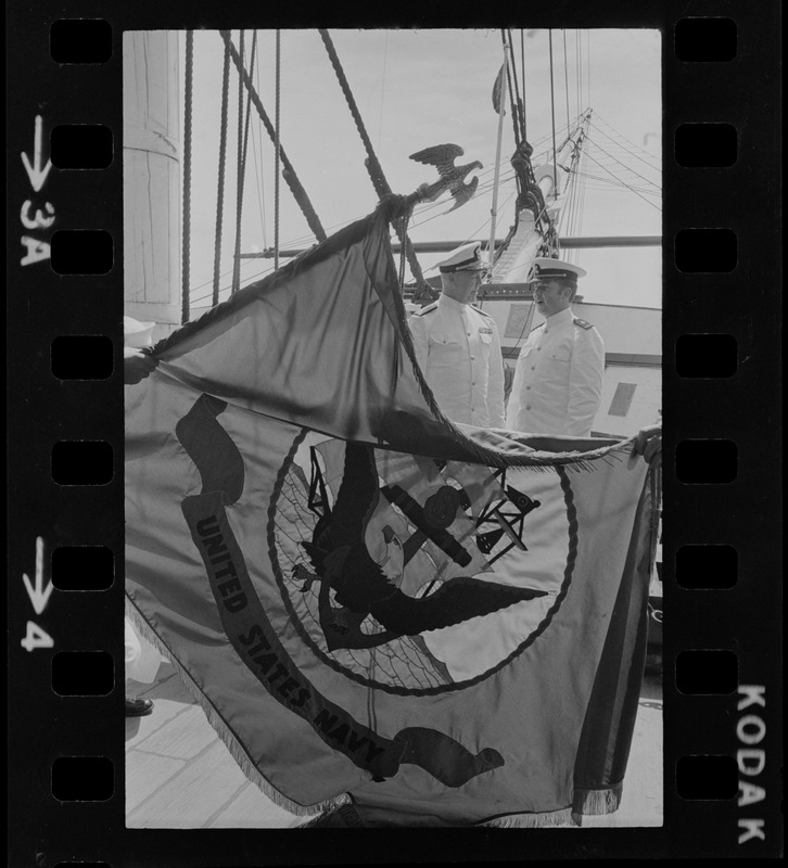 United States Navy Flag waving during Tufts NROTC commissioning ceremony on the USS Constitution