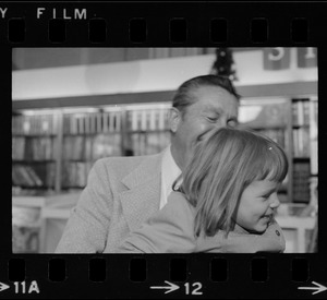 Lawrence Welk and a little girl at his book signing at Jordan's Bookmart