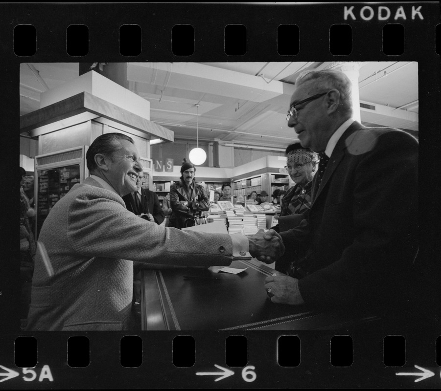 Lawrence Welk shaking hands with a fan at his book signing for his autobiography, "Wunnerful, Wunnerful," at Jordan's Bookmart