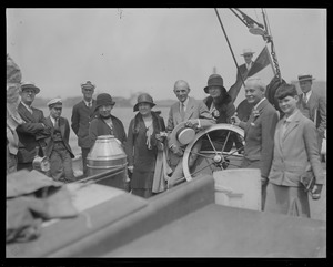Mr. and Mrs. Henry Ford visit historic T-wharf to board Grenfell expedition schooner George B. Cluett off for Labrador