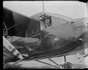 Will Rogers peers out of cockpit at East Boston Airport