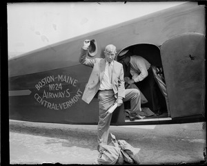 Will Rogers boarding plane at East Boston Airport
