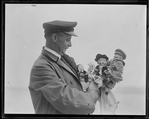 Explorer MacMillan with his dolls before his trip to the north on his good ship Bowdoin