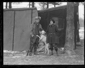 Modern William Tell Carl A. Sutter can shoot an apple off his wife Margaret's head. They live in a shack on Sabbatia Lake, North Taunton.