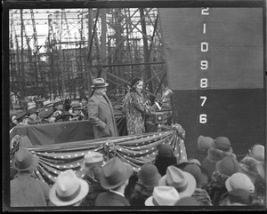 Mr. & Mrs. Jimmy Roosevelt christen the USS Farragut launched at Fore River