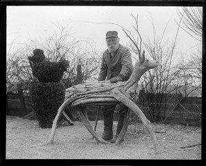 Wooden deer and George W. Kirby