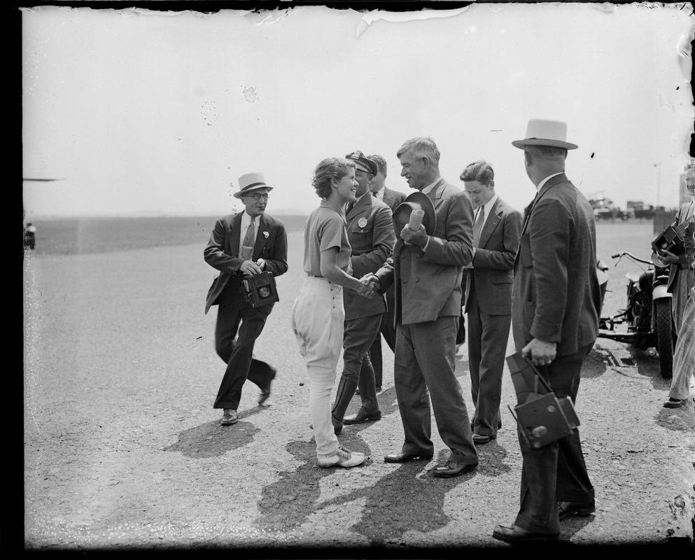 Will Rogers greeted by woman at East Boston Airport during his last visit to Boston
