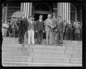 Group including James Curley and Joseph B. Ely on State House steps