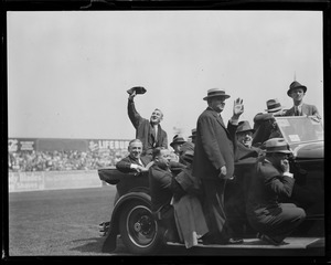 Motorcade with James M. Curley, Sen. Joe Langone, Junior, on running board