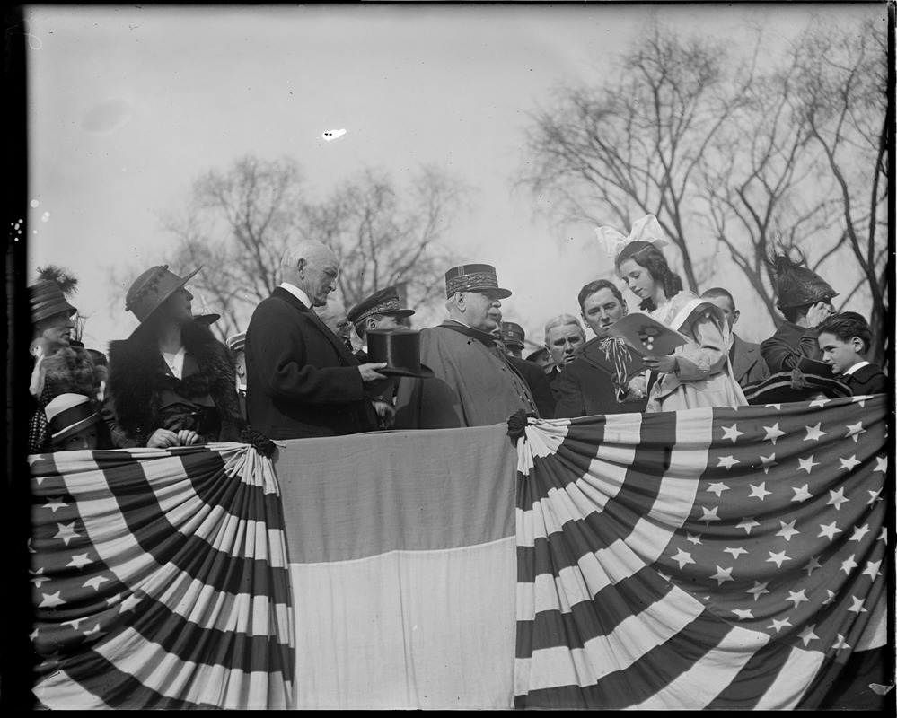 Mayor Curley looks on as daughter Mary presents big sum of money to Gen. Joffre for French orphans, on Boston Common (Gen. Edwards to left)