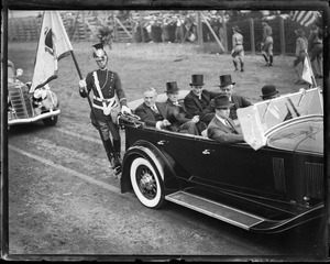 Gov. Curley in automobile procession, probably at Brockton Fair