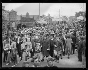 Gov. Curley strolls with crowd, probably at Brockton Fair