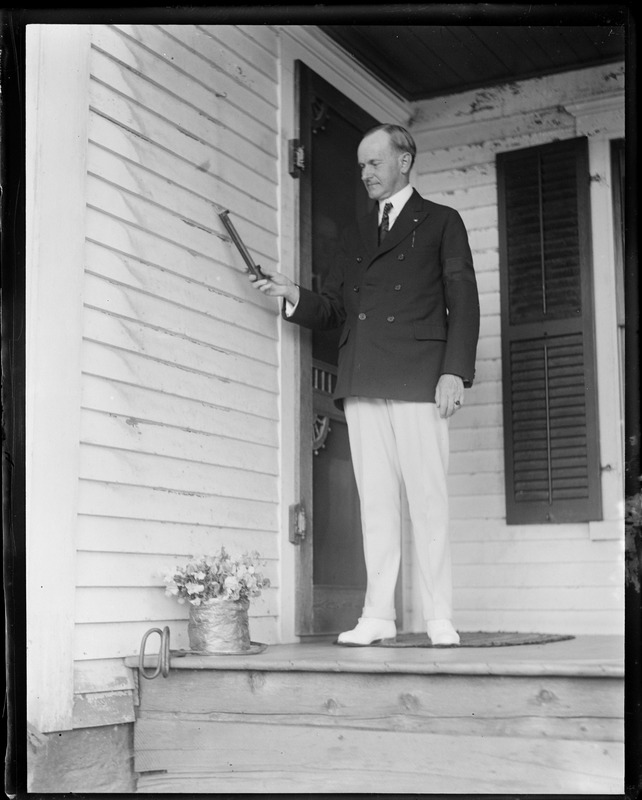 Pres. Coolidge reading thermometer in Plymouth VT. It said 80 degrees in the shade.