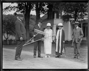 Cong. Treadway presents two rakes to Pres. Coolidge