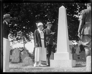 Pres. and Mrs. Coolidge read inscription on monument to Gov. William Bradford. President replied "First Governor of Mass. to the people around him."