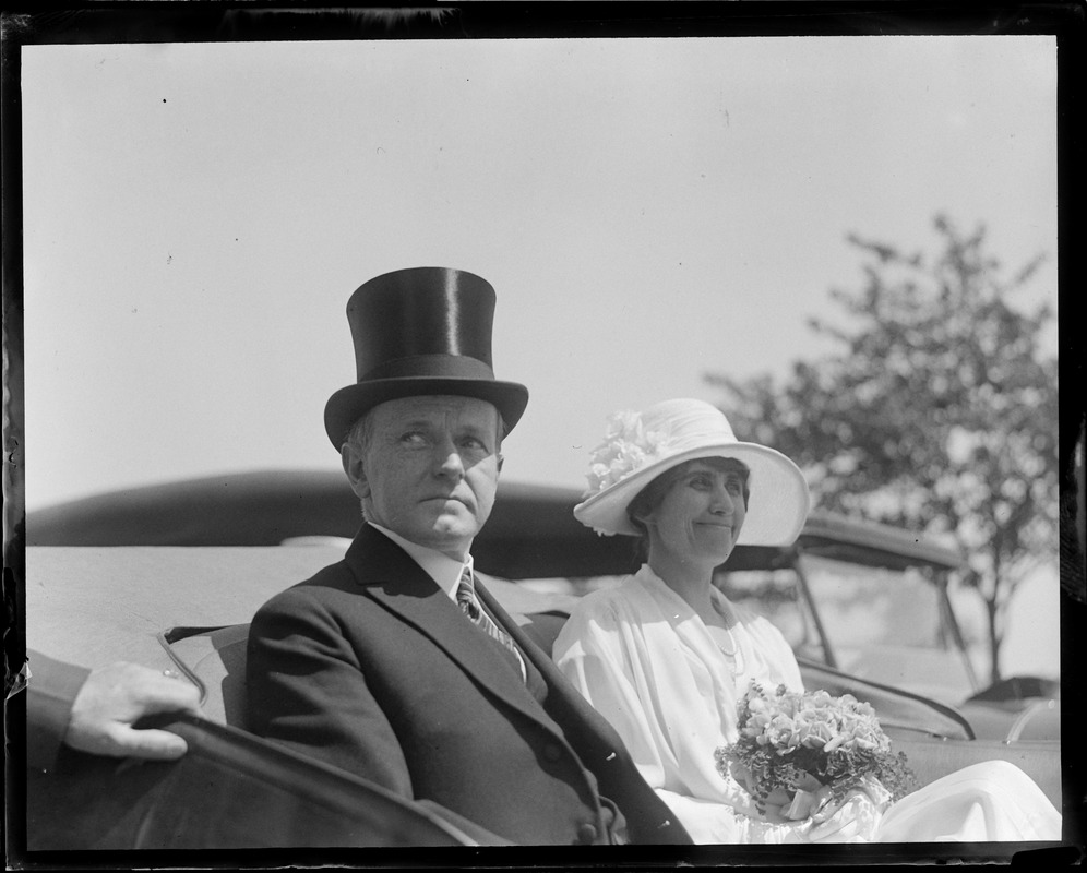 Pres. and Mrs. Coolidge in automobile
