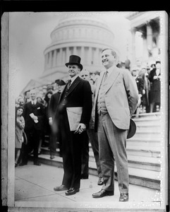 Pres. Coolidge and his secretary Everett Saunders on the capital steps
