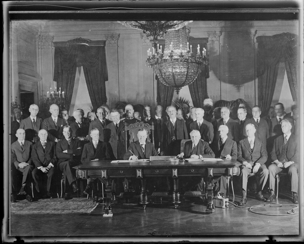 Pres. Coolidge signs the Kellogg Peace Pact