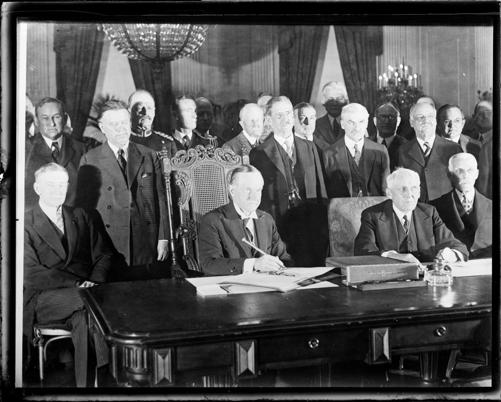 Pres. Coolidge signs the Kellogg Peace Pact