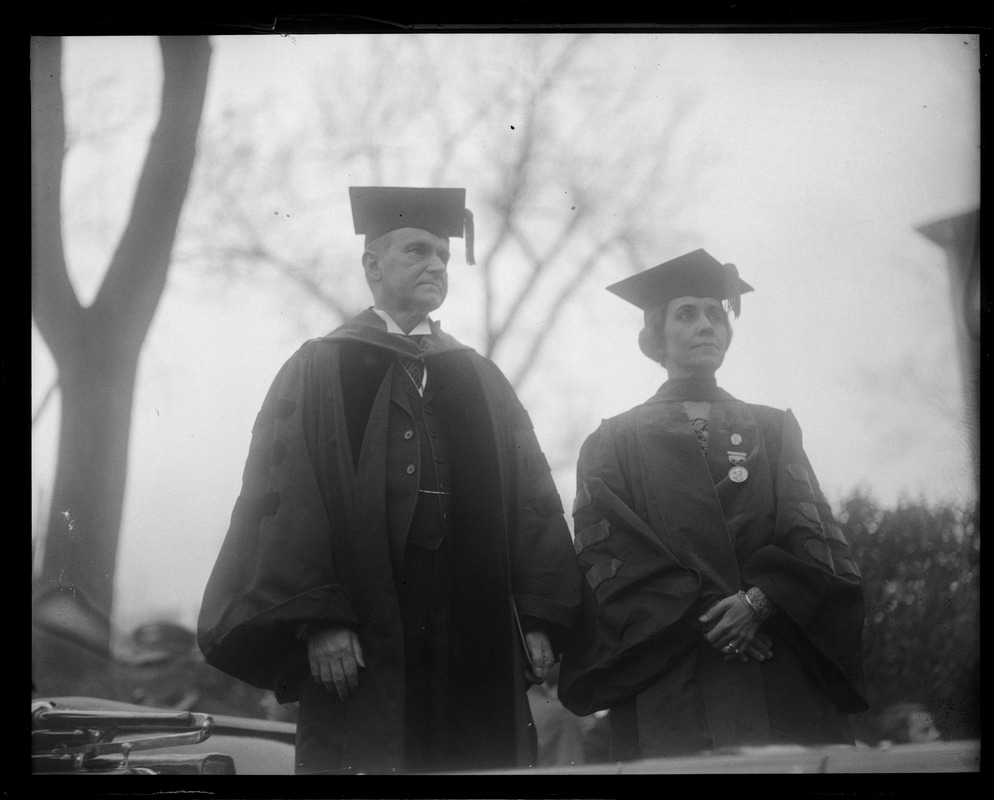 Pres. and Mrs. Coolidge in cap and gown in Andover
