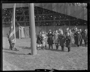 Gov. Coolidge and members of the Washington Senators raising the stars and stripes as Gen. Edwards and others look on at Fenway Park