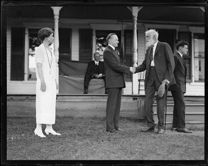 Pres. Coolidge and wife greet a civil war vet in Plymouth, VT