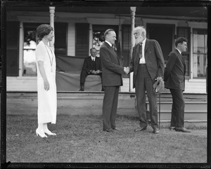 Pres. and Mrs. Coolidge shaking hands with Civil War vet at home in Plymouth, VT