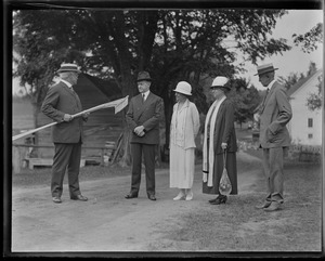 Cong. Allen J. Treadway presents Calvin Coolidge with two rakes, Plymouth, VT