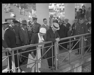 Pres. Coolidge and wife looking at the Plymouth Rock.