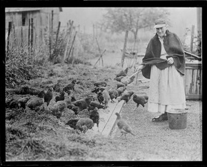 Coolidge's aunt feeding the chickens in Plymouth, VT