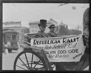 Likeness of President Coolidge - Herbert A. Turner of Cohasset (tall hat) out to boom Republican ticket in Quincy Sq.