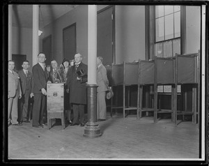 Pres. and Mrs. Coolidge cast vote for Herbert Hoover in Northampton, MA