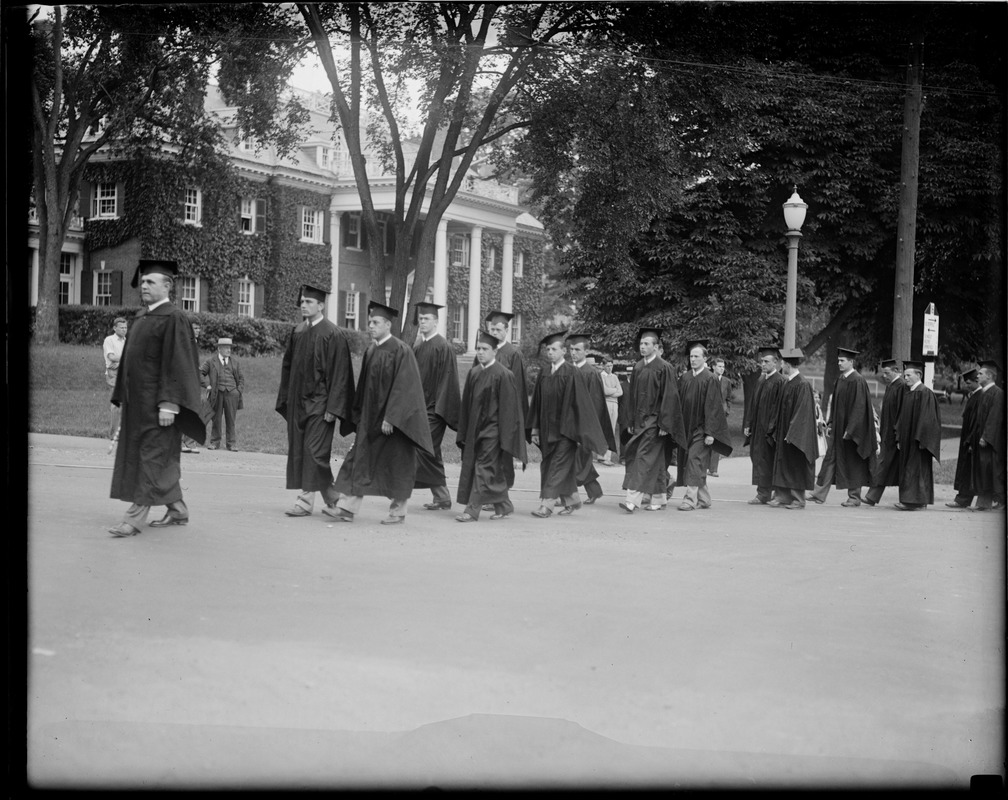 Pres. Coolidge's son John graduates at Amherst College. He is 9th in line with white spats on.