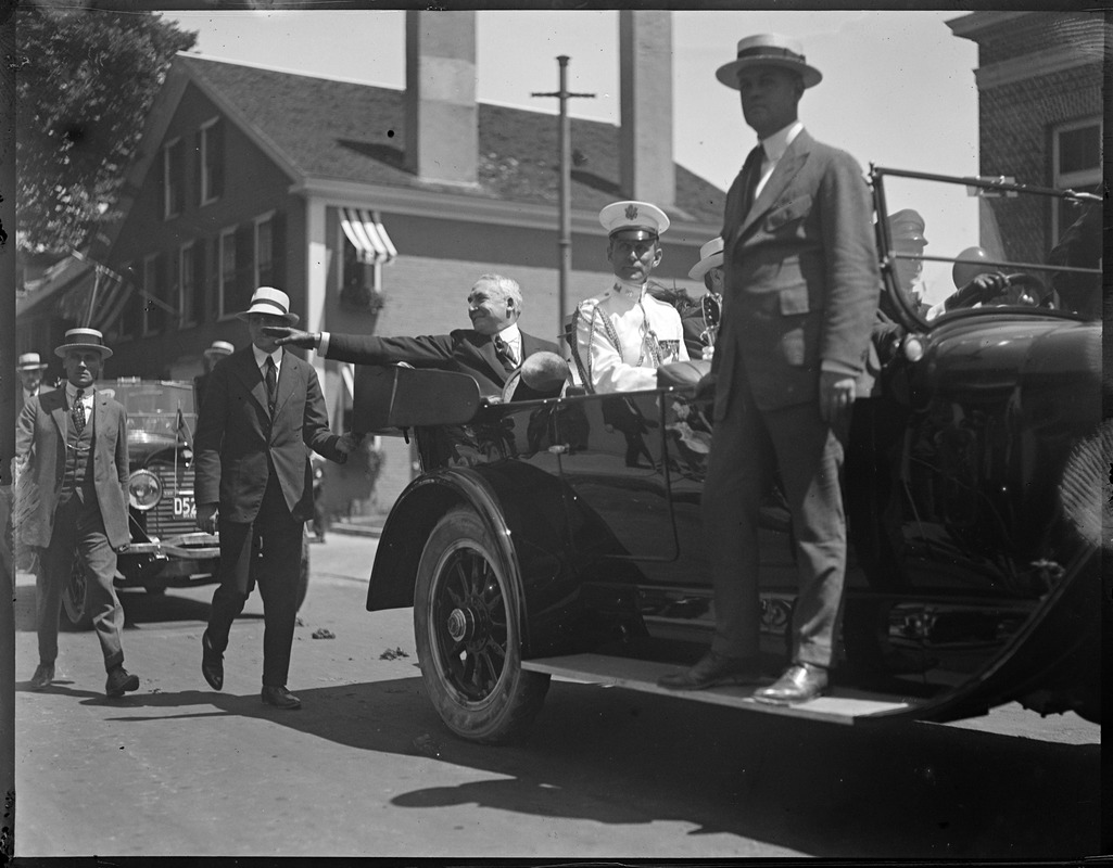 Pres. Harding waves from auto during procession in Plymouth