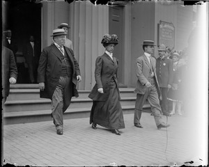 Pres. and Mrs. Taft leave church with secret service man