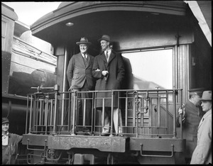 Gov. F.D. Roosevelt and son James visit Boston by train.