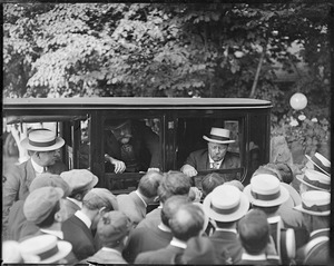 Teddy Roosevelt talking to newspapermen while visiting Harvard