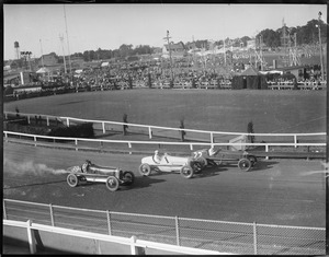 Three great auto racers race at Brockton Fair. Left to right: Ray Keech, Ralph De Palma, Norman Batten